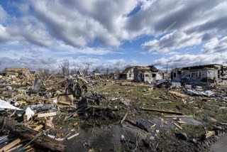 At least 26 dead after tornadoes rake US Midwest, South