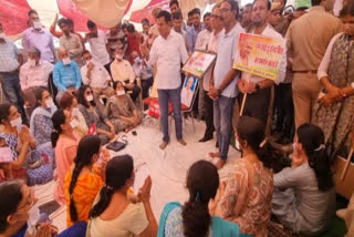 Congress workers appeal doctors to back to work in Bikaner