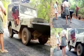 road taring jeep  Jeep used instead of road roller for road tarring  road roller  road roller for road tarring  jeep for road tarring  jeep for road work  road tarring  റോഡ് റോളർ ജീപ്പ്  റോഡ് ഉറപ്പിക്കാൻ ജീപ്പ്  റോഡ് നവീകരണത്തിൽ അഴിമതി  ടാറ് ഉറപ്പിക്കാൻ ജീപ്പ്  കാസർകോട് വാർത്തകൾ  പനത്തടി പഞ്ചായത്ത്