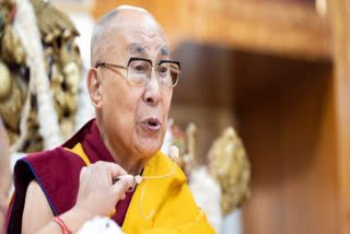 Dalai Lama 'caught' on video kissing boy on lips