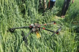 JAMMU KASHMIR SECURITY FORCES RECOVER PAK DRONE WITH ARMS AND AMMUNITION IN RAJOURI