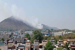 fire in pile of garbage in trenching ground indore