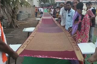 32200 names of Shriram written on 16 kg silk saree in Andhra, watch video