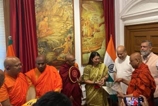 Two paintings depicting Buddhist heritage handed over to Meenakshi Lekhi