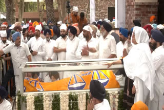 Mourners line up to pay last respects to Badal at his ancestral village