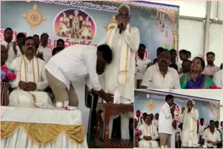 Narayanaswamy Holding The Legs Of YV Subbareddy