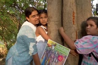 Environmental activists hold Chipko movement against felling of trees in Pune
