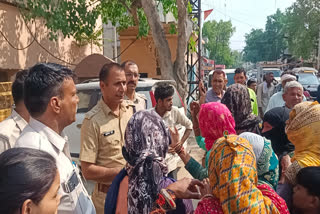 woman crushed by vehicle in Alwar, family protest in police station