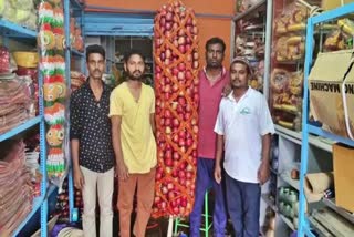 Massive garland of apples prepared for  Amit Shah