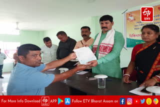 Distribution of medical aid cheques in Rangia