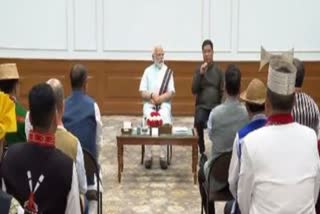 PM MODI INTERACTS WITH TRIBAL LEADERS