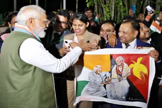 PM Modi with the Indian community