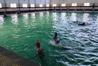 youths flocking to swimming pools in vijayapura