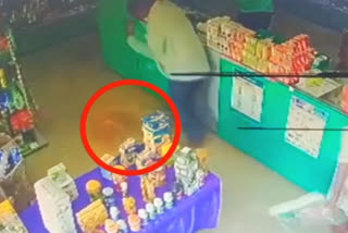 The monkey charging at a manager at a drug store in Mancherial
