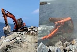 JCB fells into water  JCB fells into water during construction  JCB operator injured  അടിതെറ്റിയാൽ ജെസിബിയും വീഴും  പുലിമുട്ട് നിര്‍മാണത്തിനിടെ ജെസിബി കടലിലേക്ക്  ജെസിബി കടലിലേക്ക്  ജെസിബി  ഓപറേറ്റര്‍ക്ക് പരിക്ക്  പുലിമുട്ട് നിർമാണത്തിനിടെ