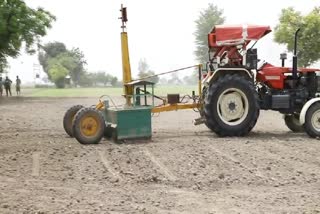 Farming with land leveler machine in Haryana
