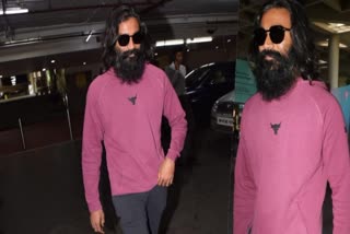 ധനുഷ്  Dhanush airport look  Dhanush new look  ധനുഷ് എയർപോർട്ട് ലുക്ക്  Dhanush airport look goes viral  ധനുഷിന്‍റെ എയർപോർട്ട് ലുക്ക്  ധനുഷിന്‍റെ പുതിയ ലുക്ക്  ധനുഷ് പ്രൊഡക്ഷൻ 15  കർണന്‍  മാരി സെൽവരാജ്  Dhanush Production 15  Arun Matheswaran  Mari Selvaraj