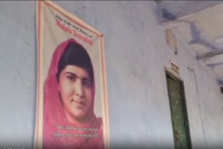 Photo of Pakistan's Nobel laureate Malala Yousafzai adoring  the wall of a Jharkhand school