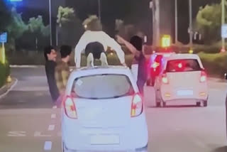 Drunk youths do push-ups atop moving car on Gurugram roads, viral video