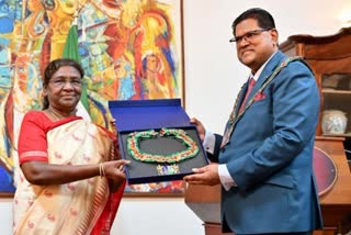 Suriname President Droupadi Murmu received Suriname highest distinction from President Chandrikapersad Santokhion