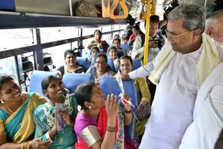 Discussing with women on the bus after launching the Shakti Yojana.