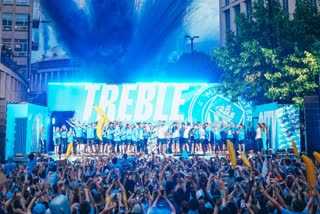 Man City celebrates winning treble of major trophies with open top bus parade in rain  Manchester City  Manchester parade  മാഞ്ചസ്റ്റർ പരേഡ്  Manchester City treble  Manchester city triple title  Manchester  Manchester parade in pics  മാഞ്ചസ്റ്റർ സിറ്റി  Uefa champions league  Manchester City winning treble  Manchester City major trophies  Pep guardiola  പെപ് ഗ്വാർഡിയോള