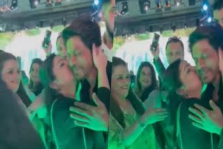 Female fan kisses actor Shah Rukh Khan