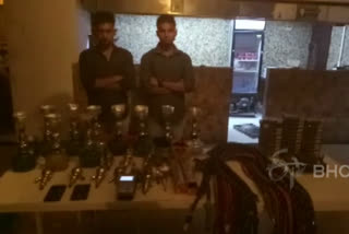 Two arrested for running a hookah center