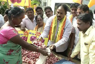 vishaka tdp mla protest against onion rate by selling 25 per kg
