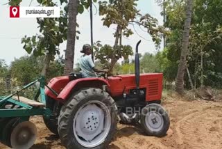 old women drives tractor
