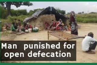 Man made to collect garbage as punishment for open defecation