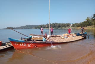 Illegal sand business : Three boatloads, more than 22 workers' shed cleared