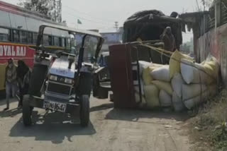 Accident overturning tractor trolley due to potholes