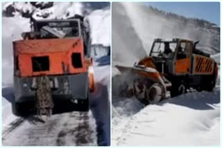 removing snow from road