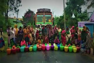 The women blocking for drinking wate