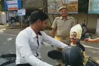 A unique traffic awareness by school student