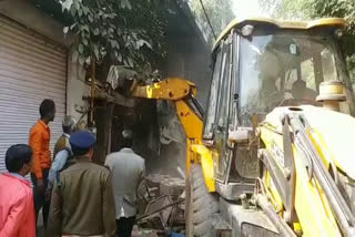 Administration runs JCB on BJP leader's hospital in gwalior