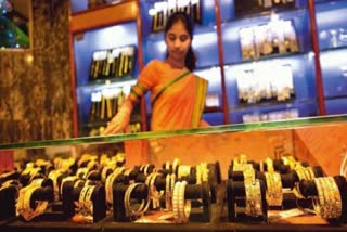 Gold slips by Rs 95 on stronger rupee, weak demand