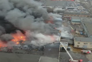 A large fire broke out on Friday at a warehouse on the outskirts of Moscow.