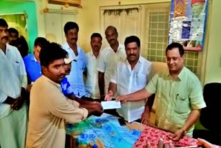 Subbareddy, distributed the insurance check