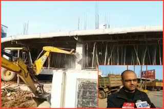 Corporation's bulldozer on illegal construction