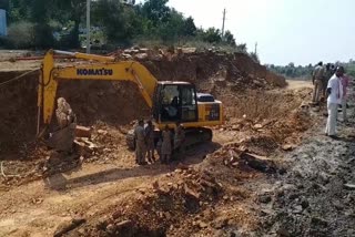 forest officers stopped road widening work atmulugu