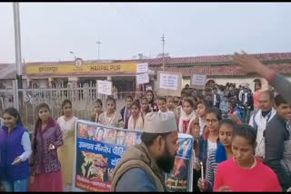 Candle march held in Harpalpur