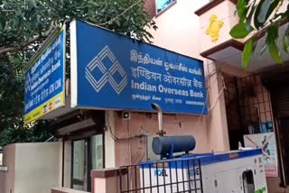 indian overseas bank worker arrested for money cheating