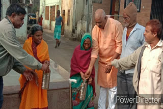 Tiffin filled with food given to poor elderly