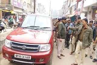 Police executed action to remove handcuffs and vehicles from the road