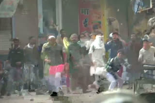 Protestors & police personnel pelt stones