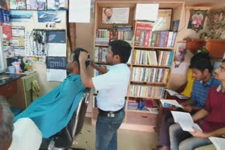 Pon Mariappan runs a library with over 200 books in his saloon shop in Millarpuram, Thoothukudi district.