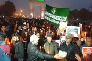 Jamia Teachers Association takes out candle march at India Gate