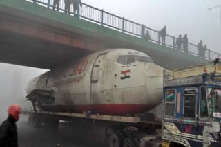 india-post-aircraft-stuck-under-durgapur-bridge